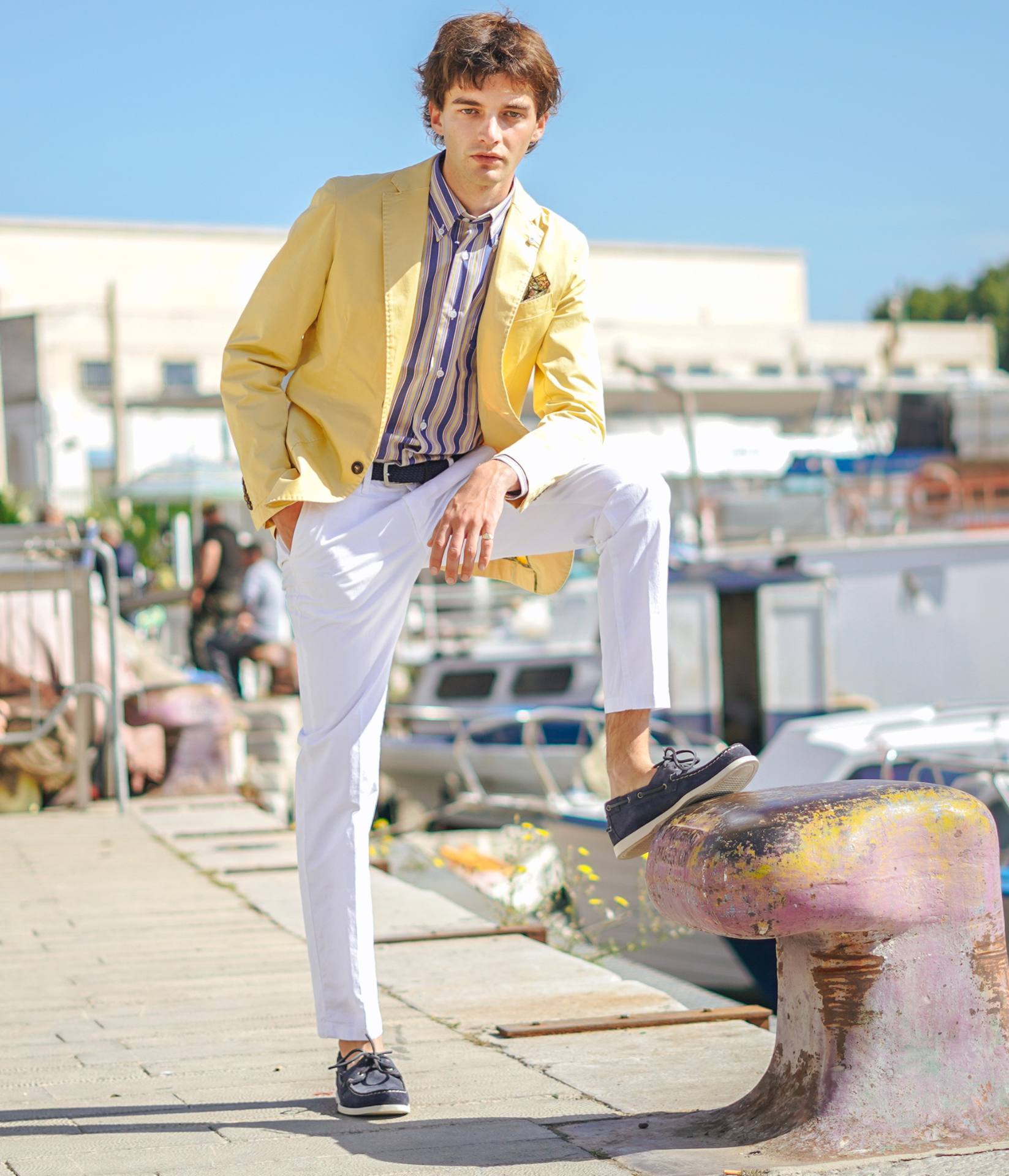Guy leaning against a dock