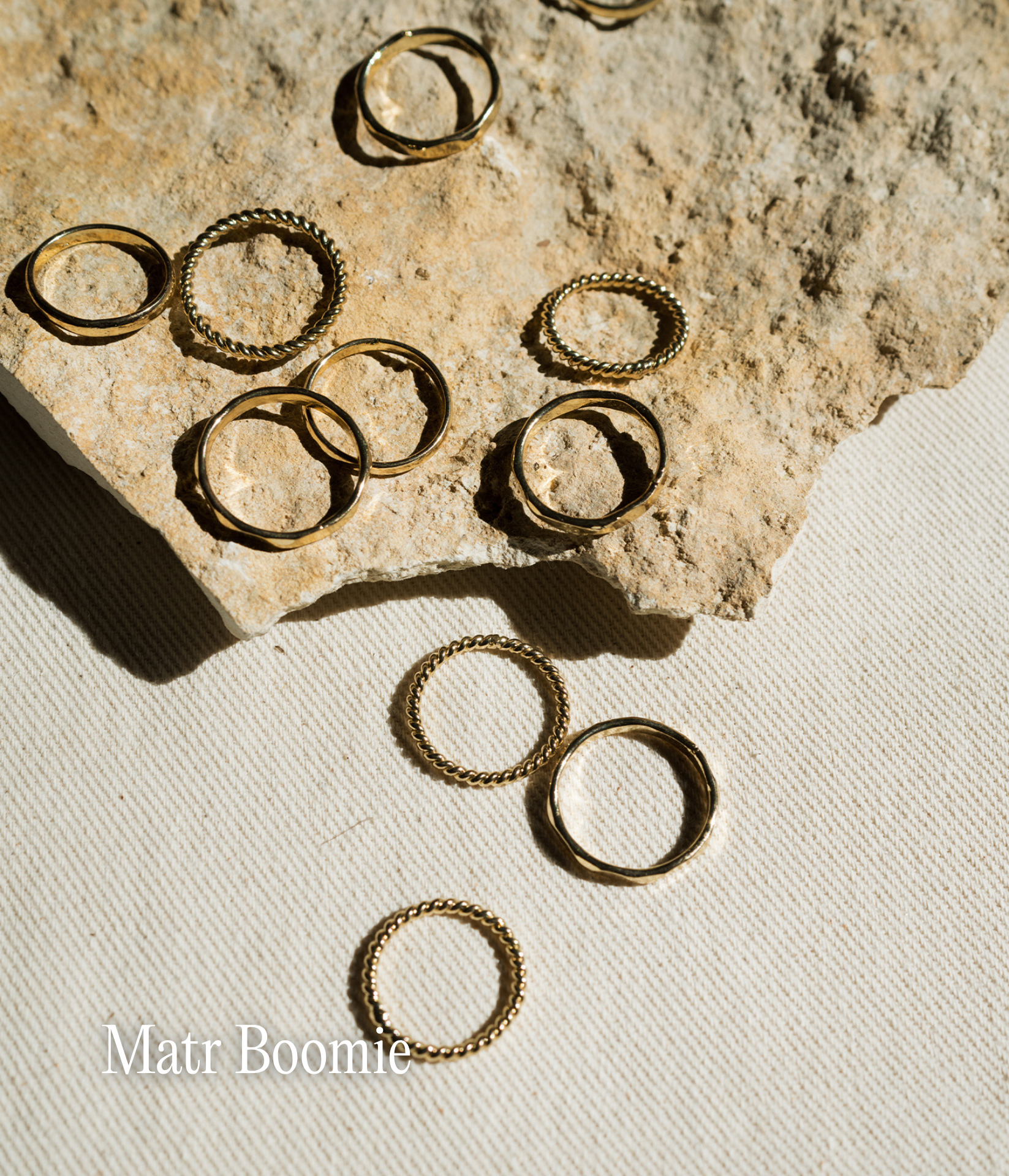 Many golden rings on a rock