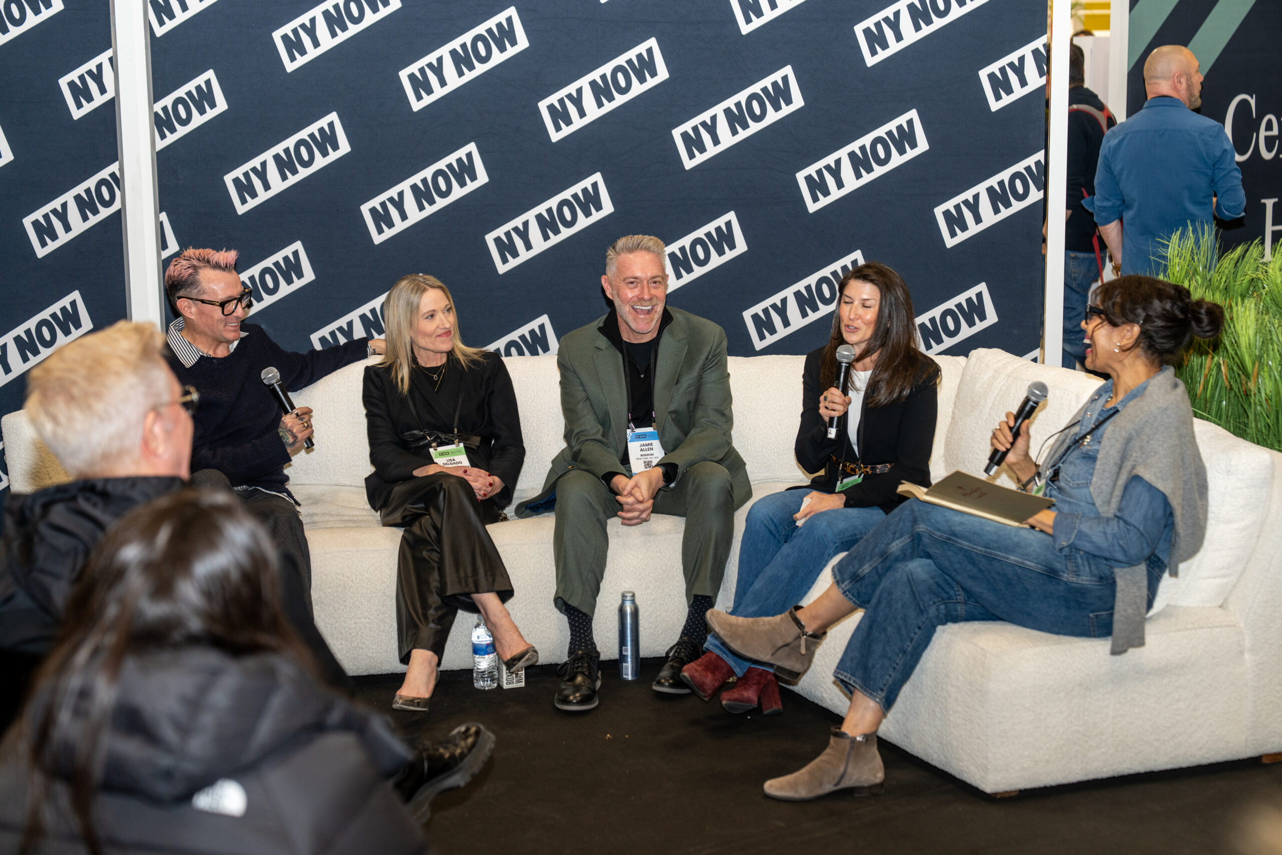 People sitting around giving a talk